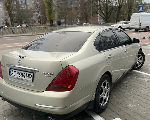 Бежевий Ніссан Теана, об'ємом двигуна 3.5 л та пробігом 208 тис. км за 6500 $, фото 5 на Automoto.ua