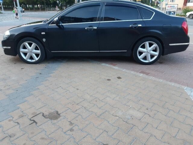 Черный Ниссан Теана, объемом двигателя 2.3 л и пробегом 330 тыс. км за 6800 $, фото 2 на Automoto.ua