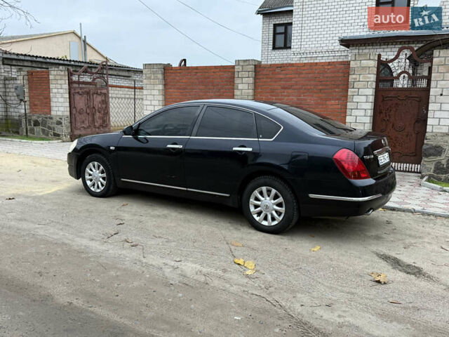 Черный Ниссан Теана, объемом двигателя 2.3 л и пробегом 334 тыс. км за 5500 $, фото 3 на Automoto.ua