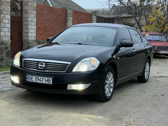 Черный Ниссан Теана, объемом двигателя 2.3 л и пробегом 334 тыс. км за 5500 $, фото 1 на Automoto.ua