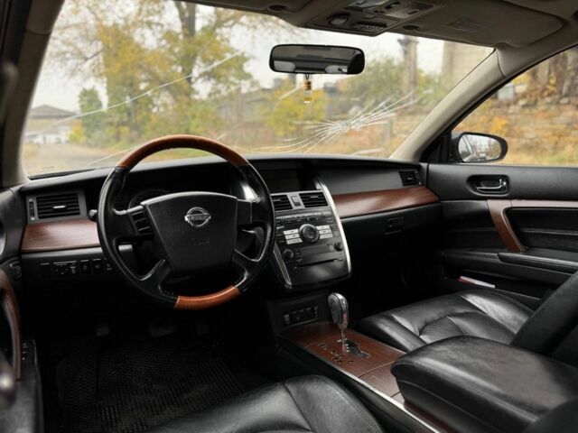 Черный Ниссан Теана, объемом двигателя 2.3 л и пробегом 220 тыс. км за 4700 $, фото 6 на Automoto.ua