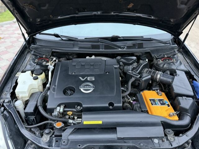 Черный Ниссан Теана, объемом двигателя 2.3 л и пробегом 334 тыс. км за 5500 $, фото 13 на Automoto.ua