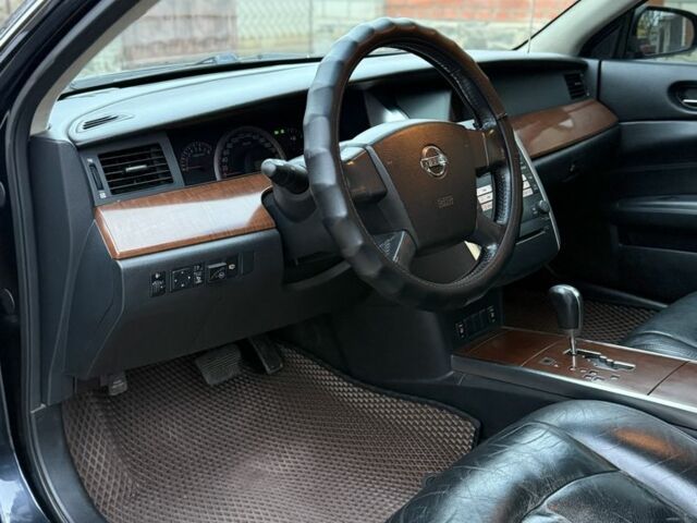 Черный Ниссан Теана, объемом двигателя 2.3 л и пробегом 334 тыс. км за 5500 $, фото 10 на Automoto.ua