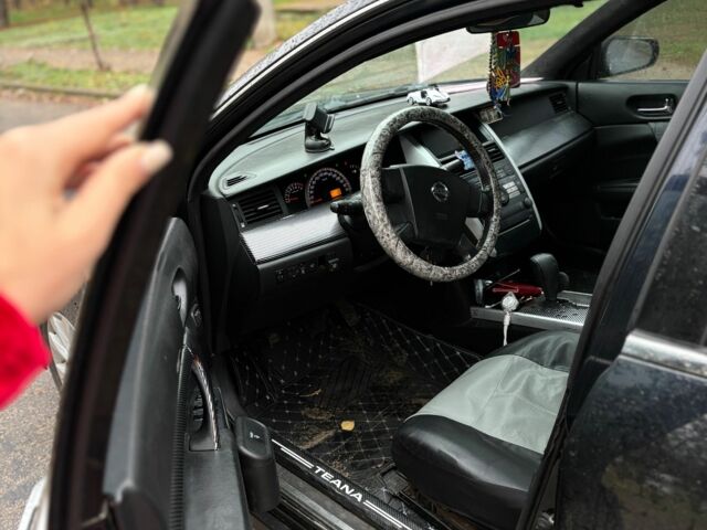 Чорний Ніссан Теана, об'ємом двигуна 2.3 л та пробігом 150 тис. км за 6500 $, фото 1 на Automoto.ua