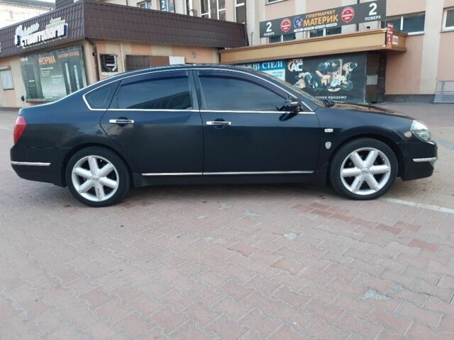 Черный Ниссан Теана, объемом двигателя 2.3 л и пробегом 330 тыс. км за 6800 $, фото 11 на Automoto.ua