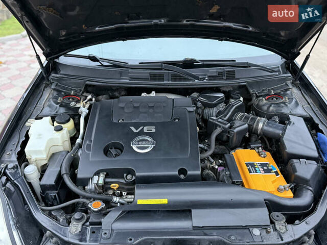 Черный Ниссан Теана, объемом двигателя 2.3 л и пробегом 334 тыс. км за 5500 $, фото 13 на Automoto.ua