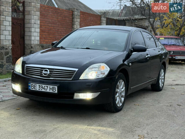 Черный Ниссан Теана, объемом двигателя 2.3 л и пробегом 334 тыс. км за 5500 $, фото 1 на Automoto.ua