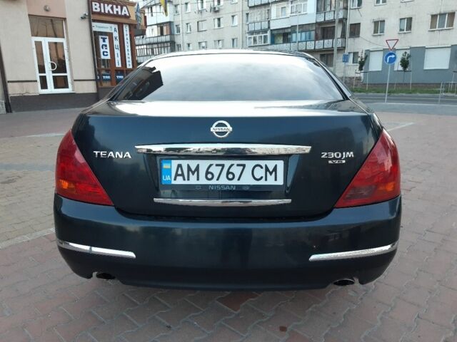 Черный Ниссан Теана, объемом двигателя 2.3 л и пробегом 330 тыс. км за 6800 $, фото 1 на Automoto.ua