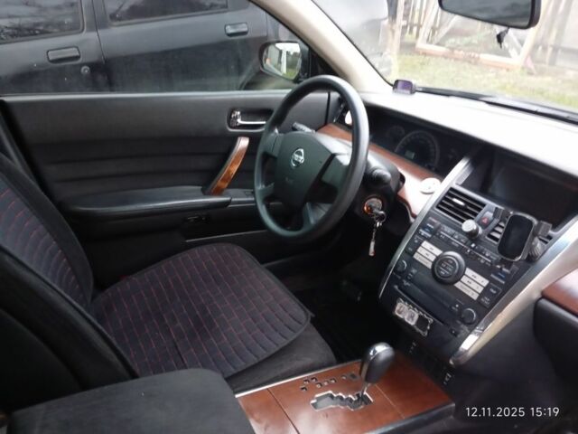 Черный Ниссан Теана, объемом двигателя 2 л и пробегом 250 тыс. км за 4100 $, фото 7 на Automoto.ua