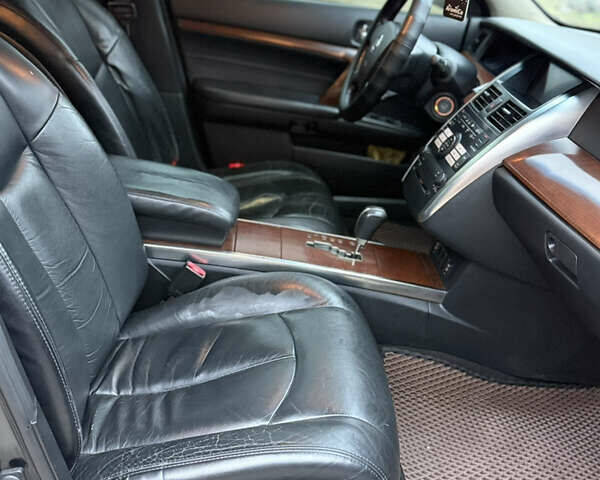 Черный Ниссан Теана, объемом двигателя 2.3 л и пробегом 334 тыс. км за 5500 $, фото 7 на Automoto.ua