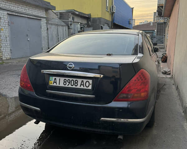 Черный Ниссан Теана, объемом двигателя 2.3 л и пробегом 260 тыс. км за 2500 $, фото 4 на Automoto.ua