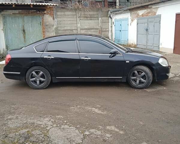 Чорний Ніссан Теана, об'ємом двигуна 2.35 л та пробігом 220 тис. км за 5600 $, фото 9 на Automoto.ua