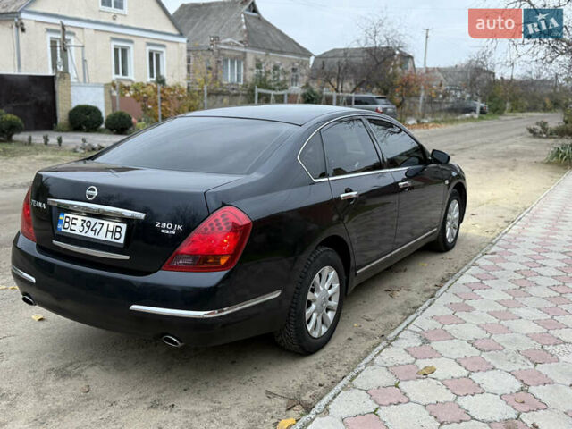 Черный Ниссан Теана, объемом двигателя 2.3 л и пробегом 334 тыс. км за 5500 $, фото 5 на Automoto.ua