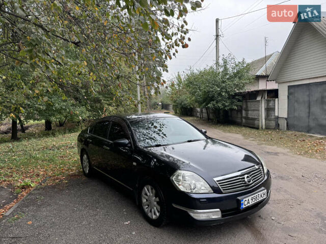 Черный Ниссан Теана, объемом двигателя 2 л и пробегом 170 тыс. км за 5500 $, фото 2 на Automoto.ua