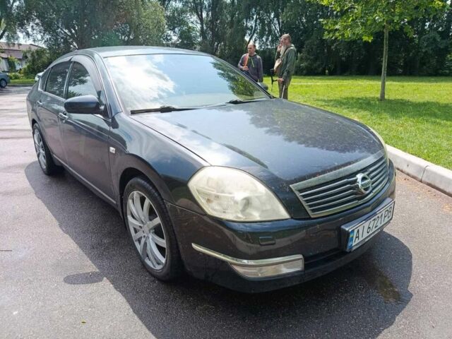 Черный Ниссан Теана, объемом двигателя 3.5 л и пробегом 240 тыс. км за 4500 $, фото 1 на Automoto.ua