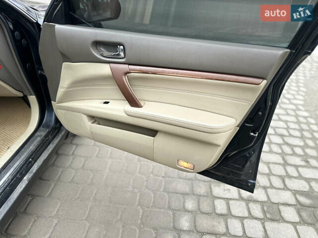 Черный Ниссан Теана, объемом двигателя 3.5 л и пробегом 315 тыс. км за 4500 $, фото 6 на Automoto.ua