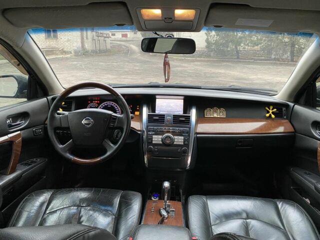 Черный Ниссан Теана, объемом двигателя 3.5 л и пробегом 237 тыс. км за 5650 $, фото 9 на Automoto.ua