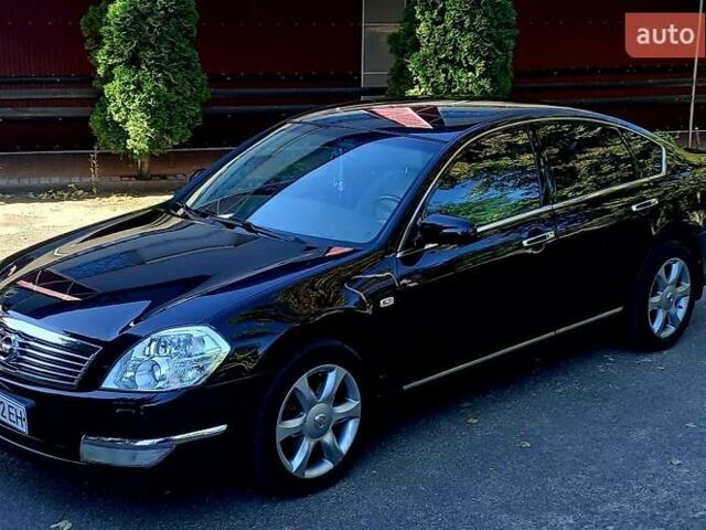 Черный Ниссан Теана, объемом двигателя 3.5 л и пробегом 202 тыс. км за 6800 $, фото 1 на Automoto.ua