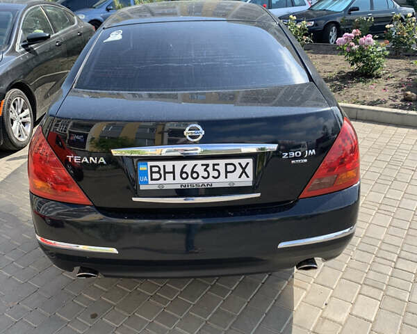 Черный Ниссан Теана, объемом двигателя 2.35 л и пробегом 216 тыс. км за 5000 $, фото 5 на Automoto.ua