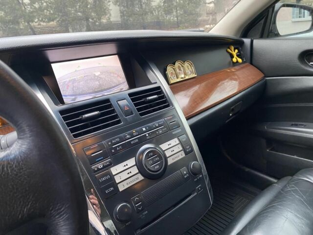 Черный Ниссан Теана, объемом двигателя 3.5 л и пробегом 237 тыс. км за 5650 $, фото 7 на Automoto.ua