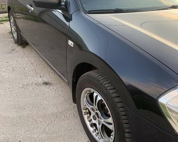 Черный Ниссан Теана, объемом двигателя 2 л и пробегом 221 тыс. км за 5000 $, фото 4 на Automoto.ua