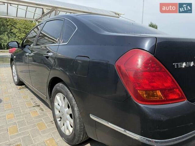 Черный Ниссан Теана, объемом двигателя 2.35 л и пробегом 181 тыс. км за 6300 $, фото 12 на Automoto.ua