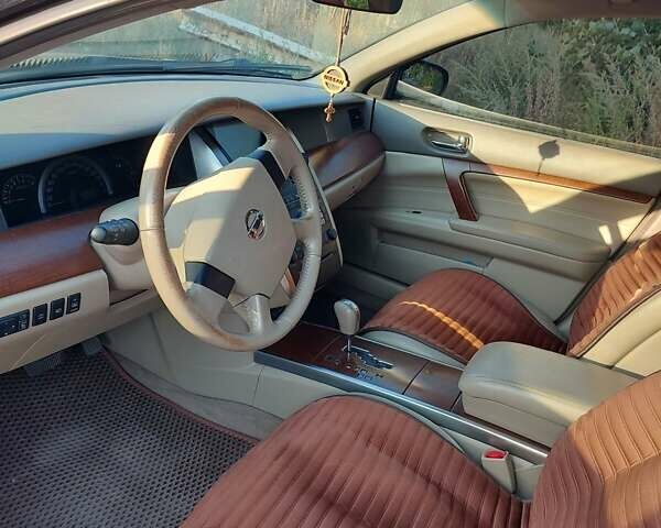 Черный Ниссан Теана, объемом двигателя 2.35 л и пробегом 159 тыс. км за 7500 $, фото 10 на Automoto.ua