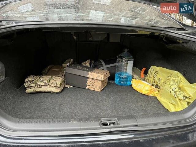 Черный Ниссан Теана, объемом двигателя 2.35 л и пробегом 250 тыс. км за 6100 $, фото 6 на Automoto.ua