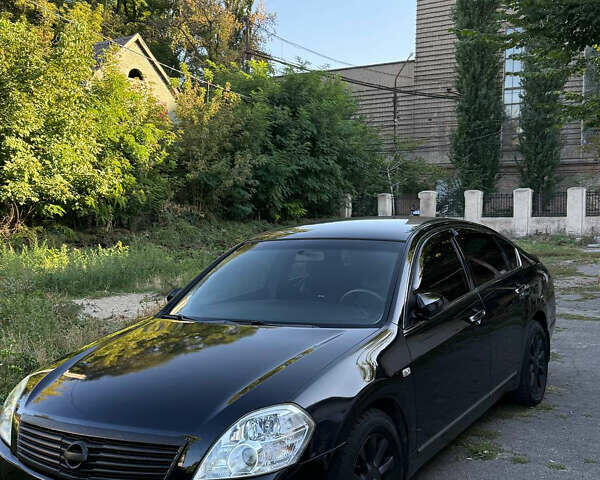 Черный Ниссан Теана, объемом двигателя 2.3 л и пробегом 225 тыс. км за 5500 $, фото 3 на Automoto.ua