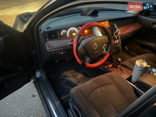 Чорний Ніссан Теана, об'ємом двигуна 2 л та пробігом 220 тис. км за 6900 $, фото 4 на Automoto.ua