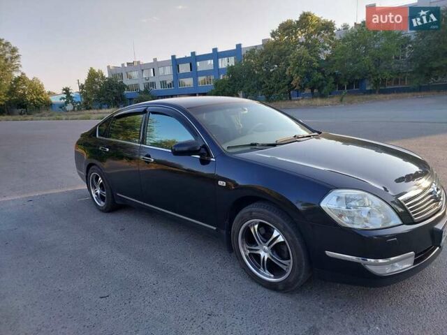 Черный Ниссан Теана, объемом двигателя 2.35 л и пробегом 159 тыс. км за 7500 $, фото 12 на Automoto.ua