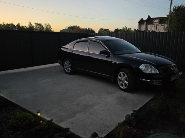 Черный Ниссан Теана, объемом двигателя 3.5 л и пробегом 301 тыс. км за 6900 $, фото 10 на Automoto.ua