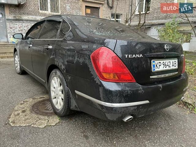 Черный Ниссан Теана, объемом двигателя 2.35 л и пробегом 250 тыс. км за 6100 $, фото 3 на Automoto.ua