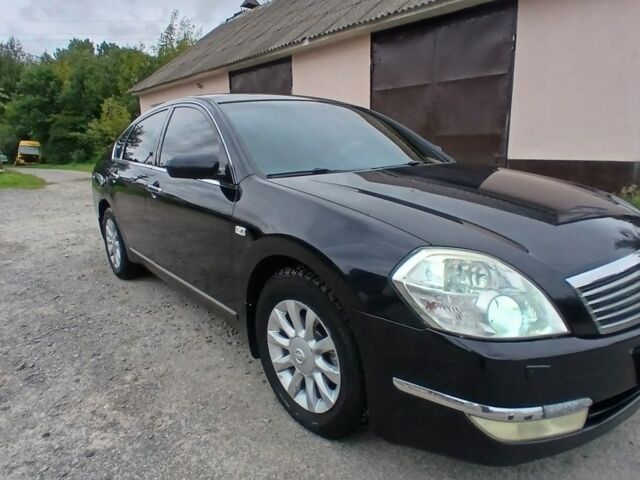Черный Ниссан Теана, объемом двигателя 2.3 л и пробегом 380 тыс. км за 5400 $, фото 5 на Automoto.ua