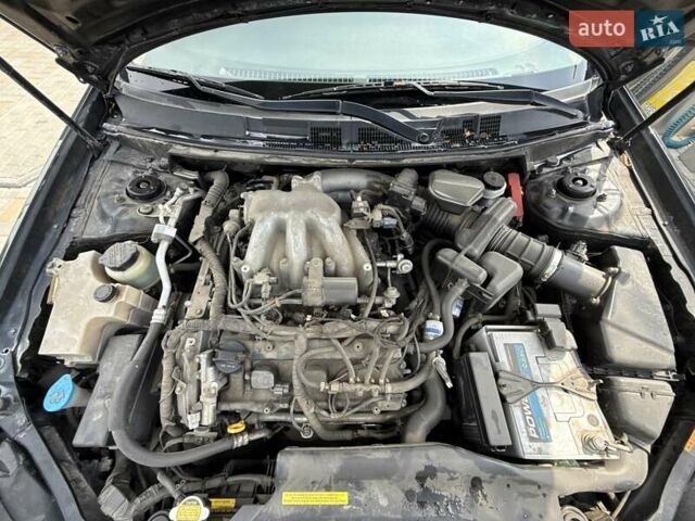 Черный Ниссан Теана, объемом двигателя 2.35 л и пробегом 181 тыс. км за 6300 $, фото 2 на Automoto.ua