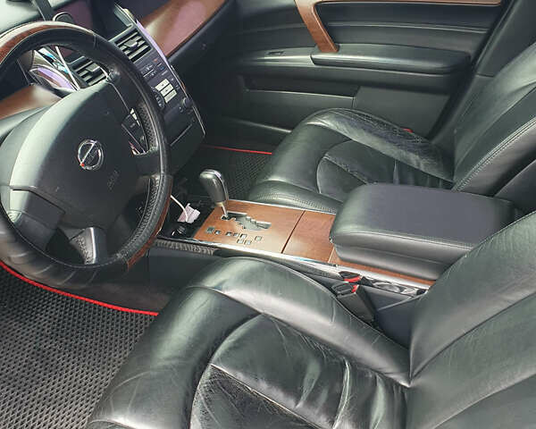 Черный Ниссан Теана, объемом двигателя 2.35 л и пробегом 216 тыс. км за 5000 $, фото 4 на Automoto.ua