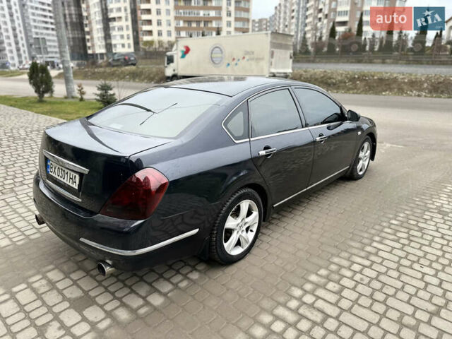 Черный Ниссан Теана, объемом двигателя 3.5 л и пробегом 315 тыс. км за 4500 $, фото 27 на Automoto.ua