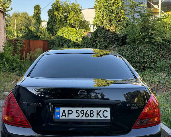 Черный Ниссан Теана, объемом двигателя 2.3 л и пробегом 225 тыс. км за 5500 $, фото 1 на Automoto.ua