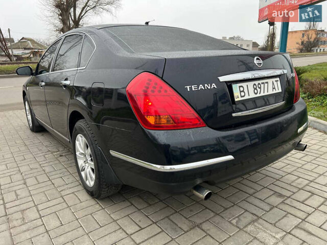 Черный Ниссан Теана, объемом двигателя 2 л и пробегом 228 тыс. км за 6700 $, фото 4 на Automoto.ua
