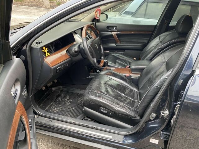 Черный Ниссан Теана, объемом двигателя 3.5 л и пробегом 237 тыс. км за 5650 $, фото 4 на Automoto.ua