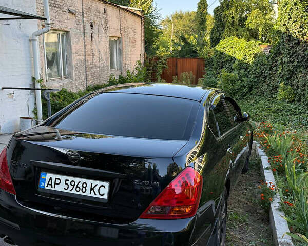 Черный Ниссан Теана, объемом двигателя 2.3 л и пробегом 225 тыс. км за 5500 $, фото 5 на Automoto.ua