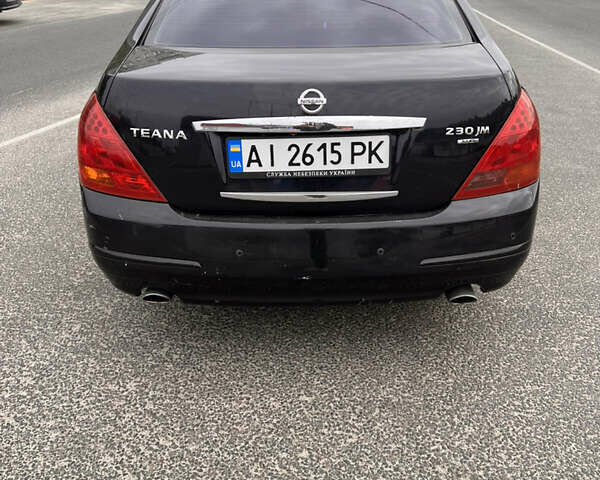 Черный Ниссан Теана, объемом двигателя 2.3 л и пробегом 329 тыс. км за 4600 $, фото 3 на Automoto.ua