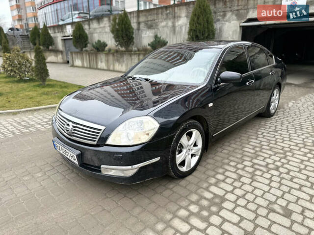 Черный Ниссан Теана, объемом двигателя 3.5 л и пробегом 315 тыс. км за 4500 $, фото 21 на Automoto.ua
