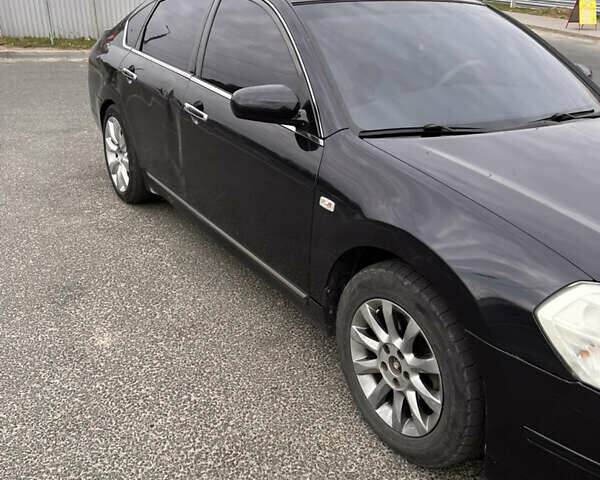 Черный Ниссан Теана, объемом двигателя 2.3 л и пробегом 329 тыс. км за 4600 $, фото 1 на Automoto.ua