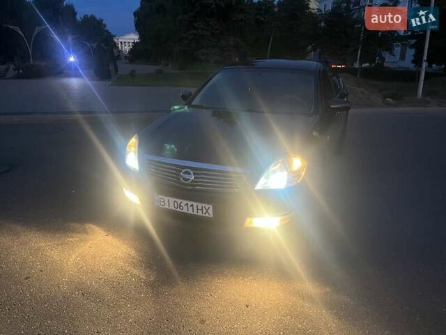 Чорний Ніссан Теана, об'ємом двигуна 2 л та пробігом 220 тис. км за 6900 $, фото 6 на Automoto.ua