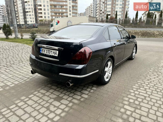Черный Ниссан Теана, объемом двигателя 3.5 л и пробегом 315 тыс. км за 4500 $, фото 29 на Automoto.ua