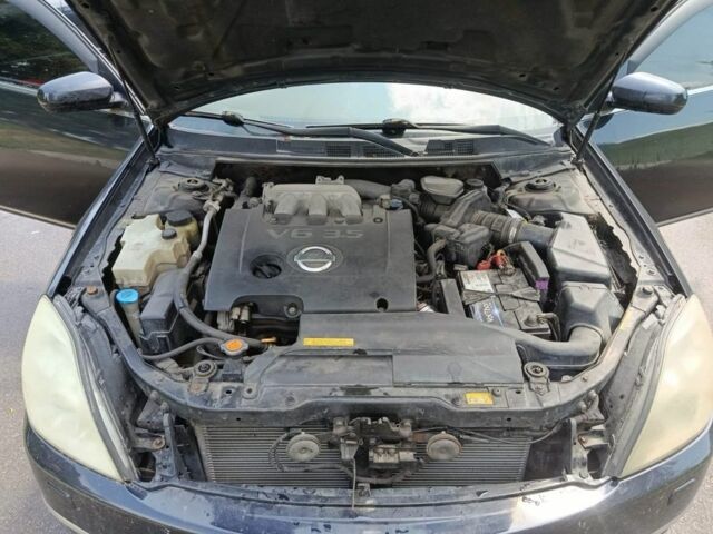 Черный Ниссан Теана, объемом двигателя 3.5 л и пробегом 240 тыс. км за 4500 $, фото 7 на Automoto.ua