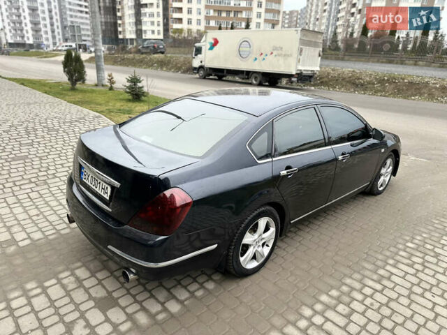 Черный Ниссан Теана, объемом двигателя 3.5 л и пробегом 315 тыс. км за 4500 $, фото 26 на Automoto.ua