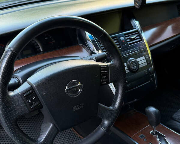 Черный Ниссан Теана, объемом двигателя 2.3 л и пробегом 225 тыс. км за 5500 $, фото 13 на Automoto.ua