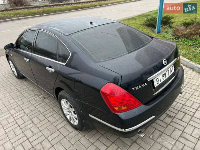 Черный Ниссан Теана, объемом двигателя 2 л и пробегом 228 тыс. км за 6700 $, фото 5 на Automoto.ua